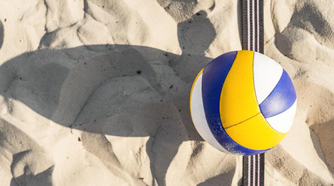 flat-lay-volleyball-beach-sand