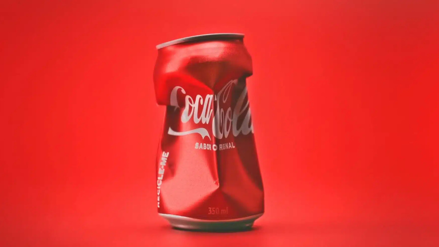 Coca-Cola pulls apart its iconic red-and-white logo to encourage recycling