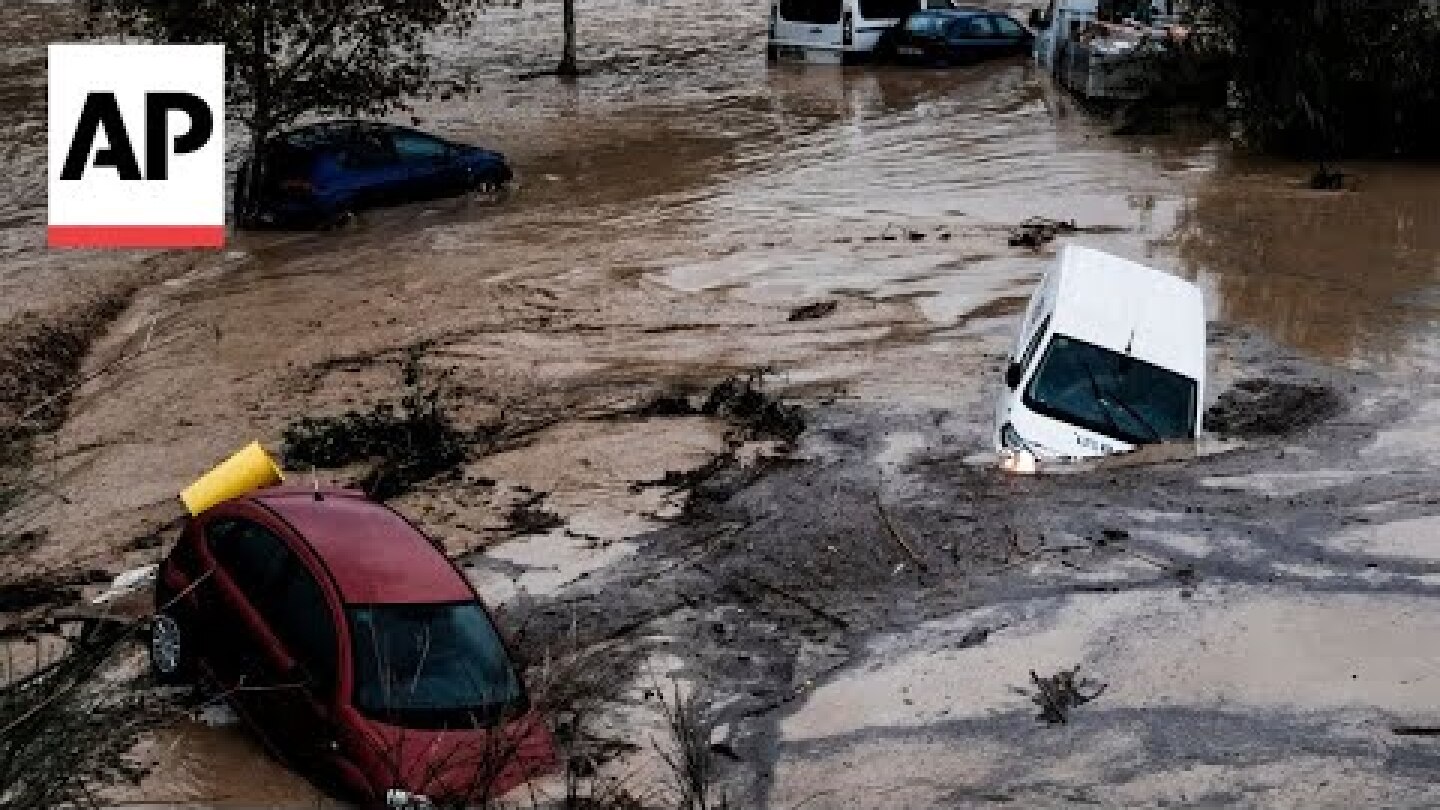 WATCH: Emergency services rescue driver trapped in flood waters in Spain